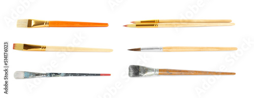 Set of different paintbrushes on white background. Banner design photo