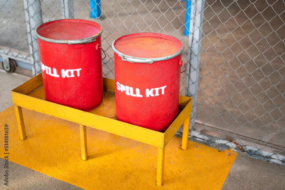 Spill kit containment boxes are prepared and placed in front of the