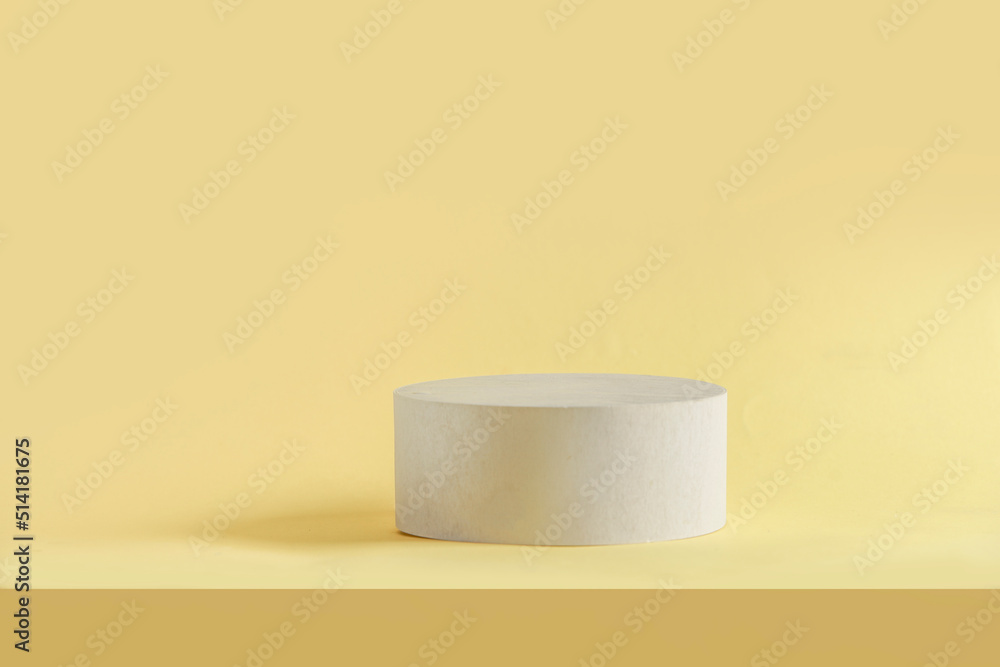 Modern product display with podium at yellow background. Minimal scene stage showcase for your product. Front view with copy space. Modern product display with podium at yellow background. Minimal scene stage showcase for your product. Front view with copy space.