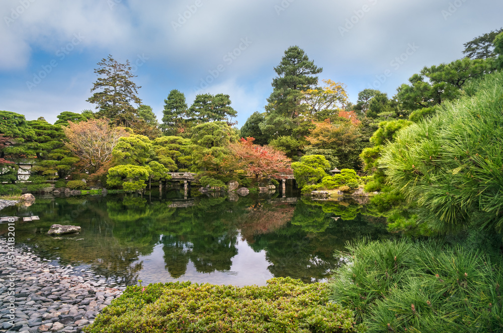 Gonaitei garden on a beautiful autumn day in Kyoto Imperial Palace in Kyoto, Japan. Oike-niwa - serene Japanese zen garden and pond. Gonaitei garden on a beautiful autumn day in Kyoto Imperial Palace in Kyoto, Japan. Oike-niwa - serene Japanese zen garden and pond.