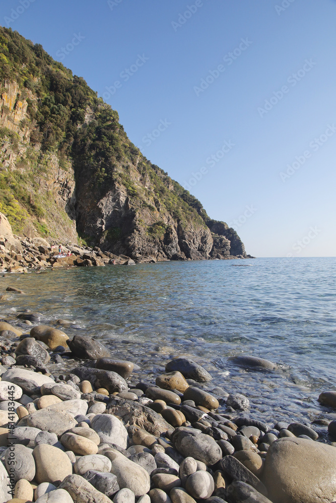 The pebble beach in Riomaggiore, Cinque Terre, Italy