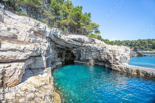 Croatia, Istria, Pula, coastline with rocks and cave