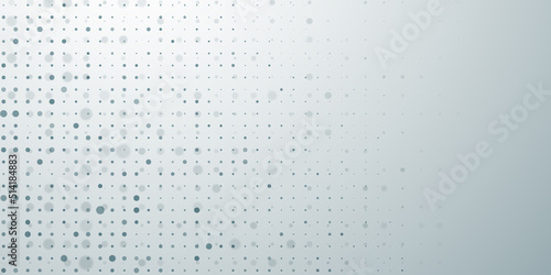 Abstract background in gray colors made of big and small dots