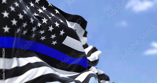 Obraz na plátne The flag of the United States of America in the Thin Blue Line variant waving in