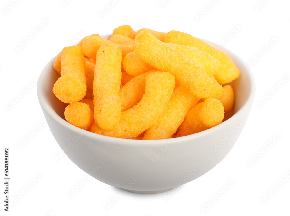 Many tasty cheesy corn puffs in bowl isolated on white
