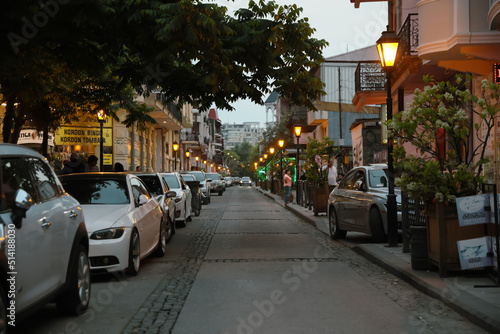 BATUMI, GEORGIA - MAY 31, 2022: Beautiful city street with buildings and parked cars in evening