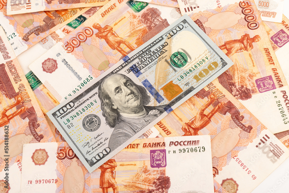 US Dollar and Russian ruble. Money background. Currency exhange. Economic crisis. Rouble dollar cash. Hundred dollar bill and 5000 rubles. Business and finance. Russia and USA US Dollar and Russian ruble. Money background. Currency exhange. Economic crisis. Rouble dollar cash. Hundred dollar bill and 5000 rubles. Business and finance. Russia and USA