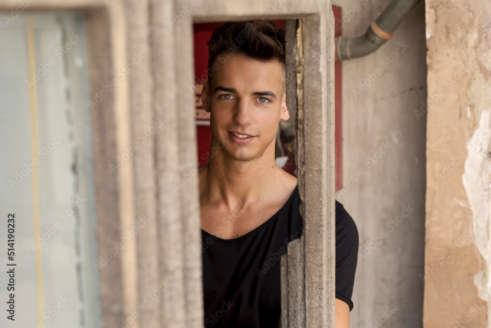 Fototapeta premium Portrait of smiling young man outdoors