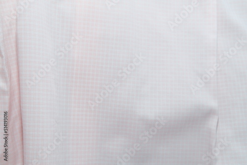 Close up of a white shirt.