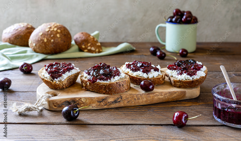 Wholewheat toasts with ricotta and homemade sweet cherry jam