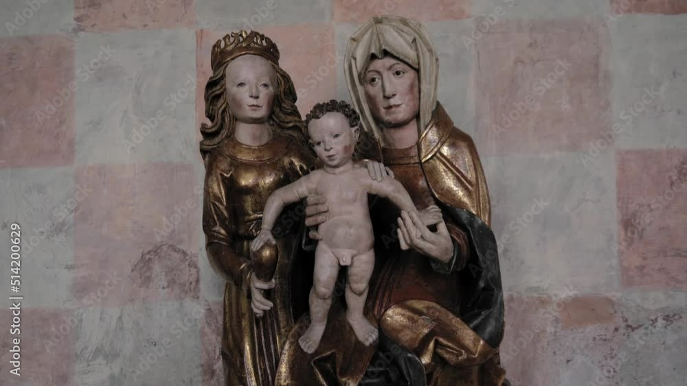 Divine Figurine Of Baby Jesus, Virgin Mary And Joseph In Lidzbark, Warmia-Masuria Province, Poland. Handheld Divine Figurine Of Baby Jesus, Virgin Mary And Joseph In Lidzbark, Warmia-Masuria Province, Poland. Handheld