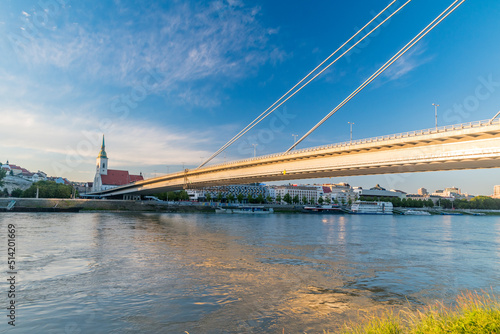 Sunset view National Uprising bridge over Danube river in Bratislava, Slovakia.