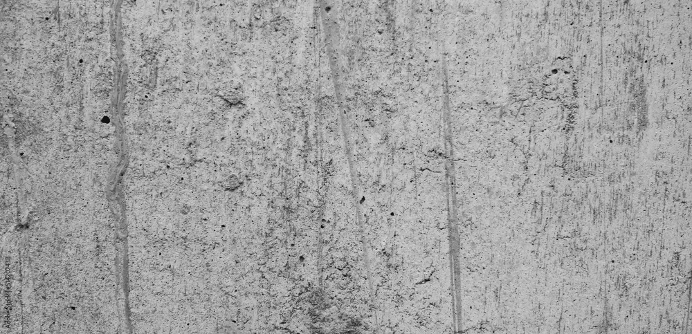 Abstract concrete wall on white base. Colorless background. Only black and white.