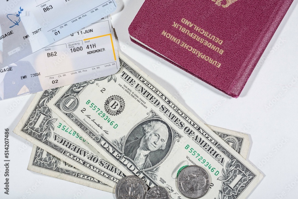 american dollars, flight tickets and a passport american dollars, flight tickets and a passport