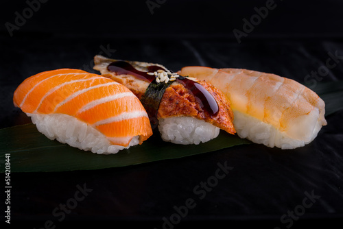 Roll with eel, shrimp, salmon