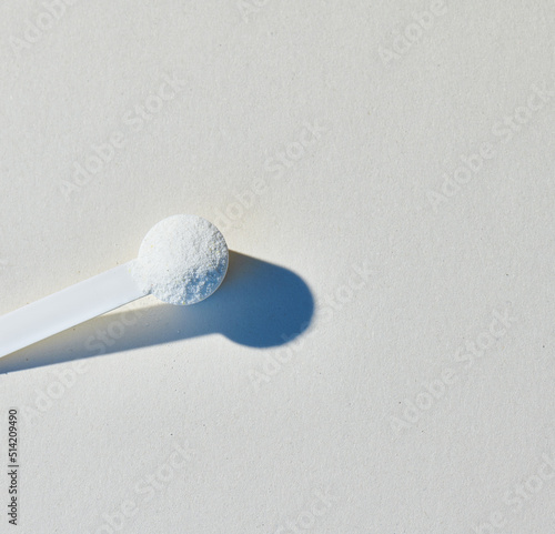 Sport food supplement powder with natural white background and props. Taurine, protein, vitamine, bcaa, amino acid or drug in a white scoop. Sport nutrition
→ Check my profile for more! ←
