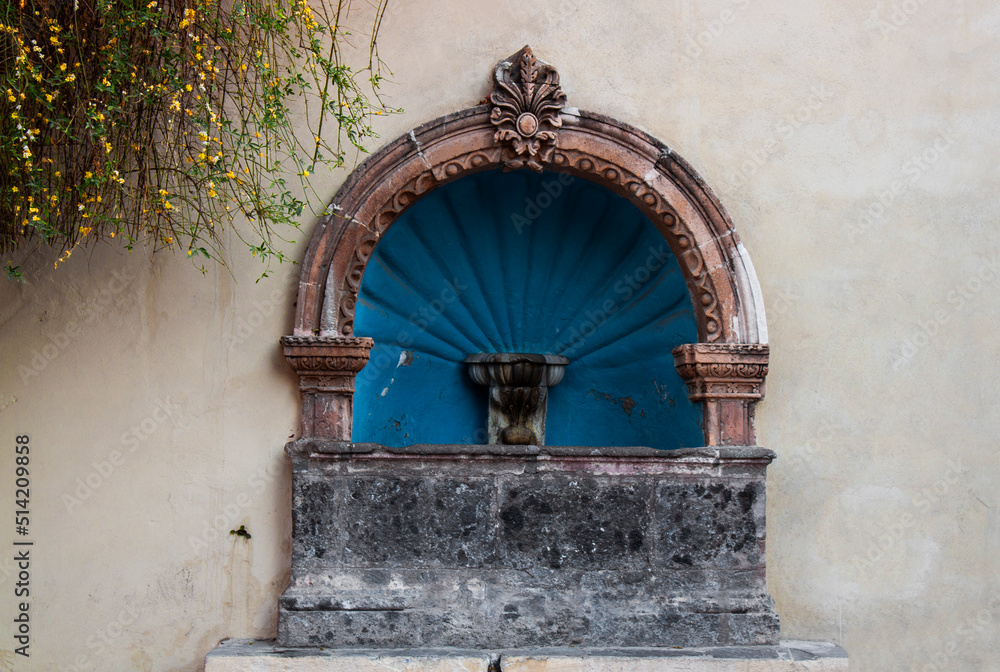 Ancient stone fountain in the old town streets of San Miguel de Allende, Guanajuato state, Mexico. Ancient stone fountain in the old town streets of San Miguel de Allende, Guanajuato state, Mexico.