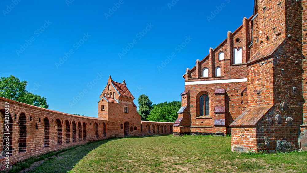 St. Lawrence, erected in the Gothic style with a defensive wall in 1518 in Kleczków in Masovia, Poland. General view and details of the construction of the temple and wall at the photo.