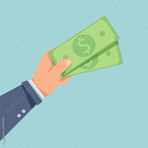 The hand holds money. Transferring money from hand to hand. Payment for services. Businessman is holding money.