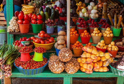 Mexican local street market displays colorful fresh tropical fruits and vegetables in San Cristobal de las Casas, Chiapas, Mexico.