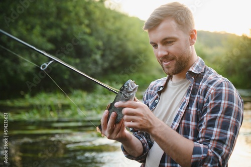 Male hobby. Ready for fishing. Relax in natural environment. Trout bait. Bearded elegant man. Man relaxing nature background. Strategy. Hobby sport activity. Activity and hobby. Catching and fishing