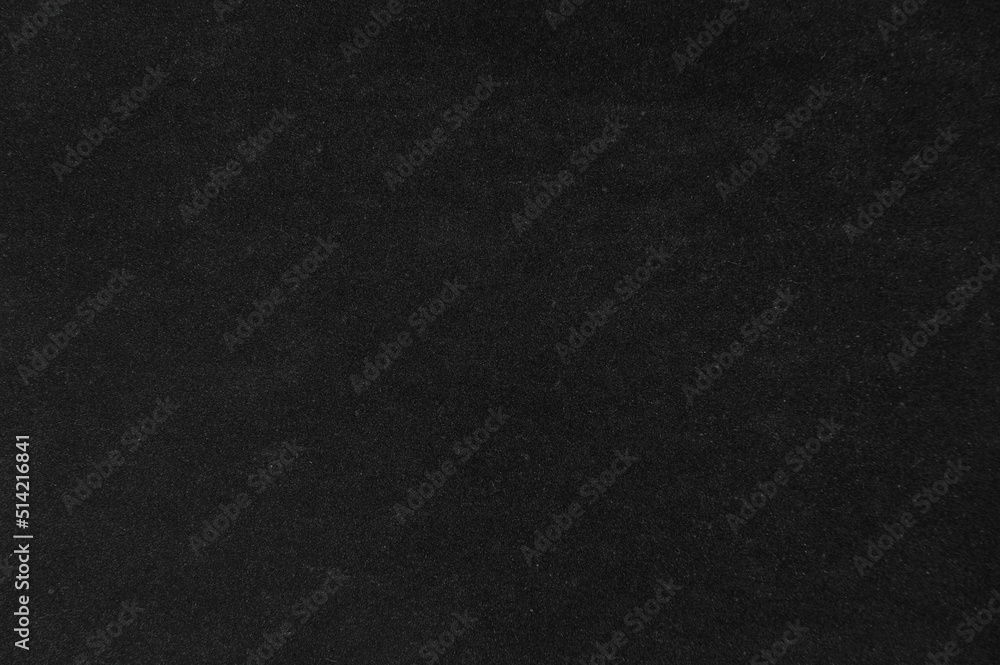 Textured black paper background texture. Dark velvet.