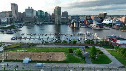 Aerial truck shot of Baltimore Inner Harbor from Federal Hill. Marina and boats at golden hour. photo