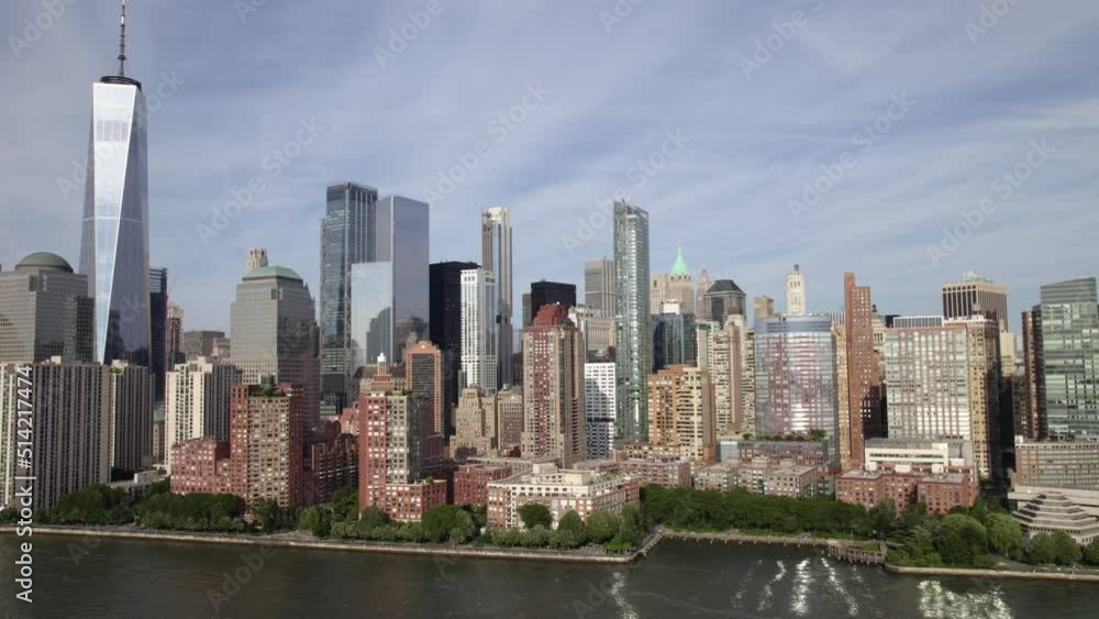 Aerial view approaching high-rise in lower Manhattan, in NYC, USA - rising, drone shot Aerial view approaching high-rise in lower Manhattan, in NYC, USA - rising, drone shot