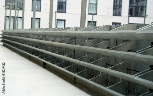 Stacked recycled flower boxes from plastic residual mix waste as the basis for a green wall. Basic construction of a vertical facade garden on behalf of climate adaptation. photo