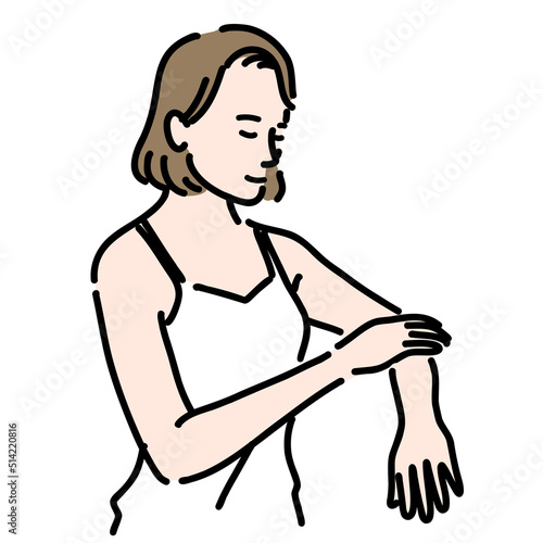腕のケアをしている若い女性
