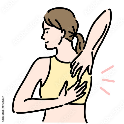 背中の後ろで手を組もうとしている若い女性
