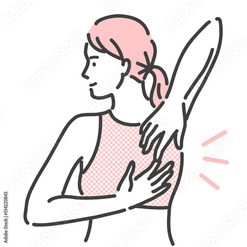 背中の後ろで手を組もうとしている若い女性
