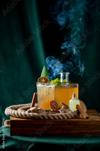 Coctail with cinnamon and citra juce. smoke