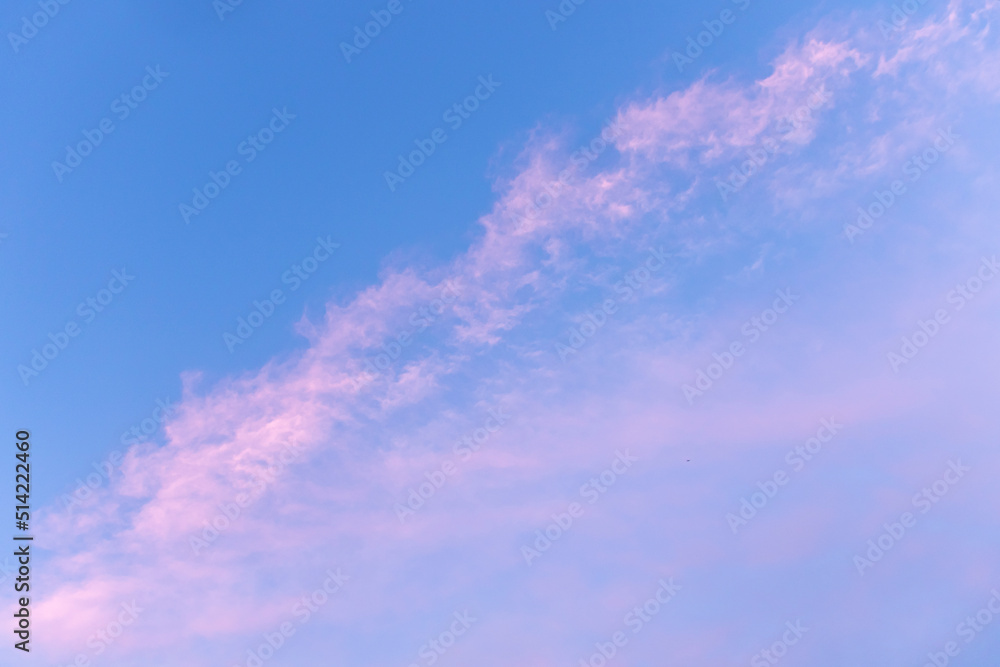 Pink clouds on a blue background