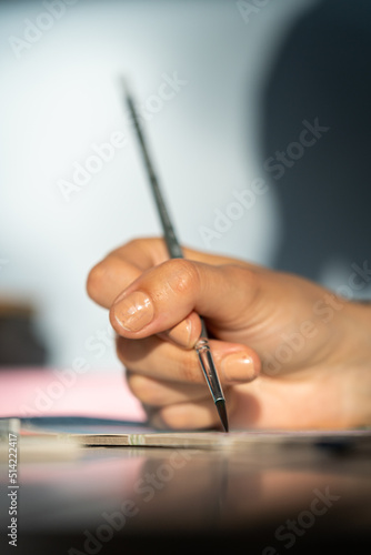 hand with pen