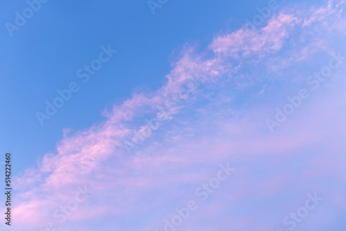 Pink clouds on a blue background