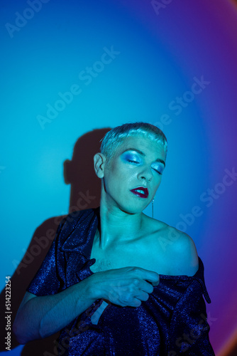 Wallpaper Mural Transgender With Eyeshadow Posing On Illuminated Background Torontodigital.ca