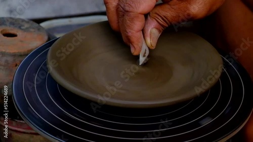 hands of a potter at work
