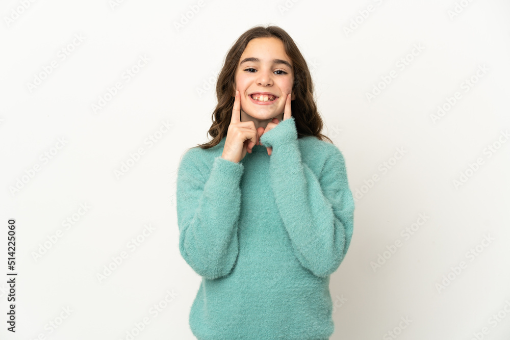 Little caucasian girl isolated on white background smiling with a happy and pleasant expression Little caucasian girl isolated on white background smiling with a happy and pleasant expression