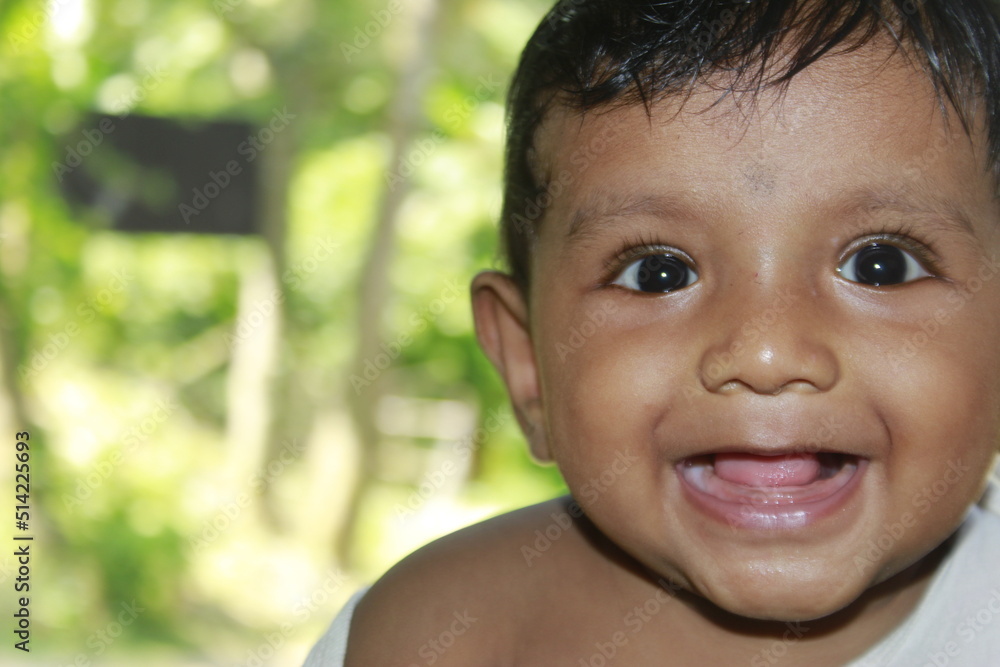 Portrait of a cute Indian little baby boy, funny, Happy and laughing baby looking at camera Portrait of a cute Indian little baby boy, funny, Happy and laughing baby looking at camera