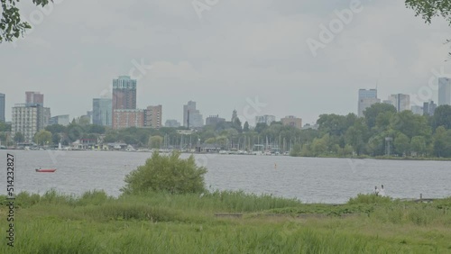 Static view of Rotterdam skyline seen from Kralingse Bos in the Netherlands photo