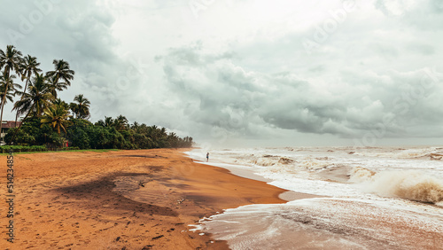 View of the Indian Ocean in stormy weather. Hikkaduwa Beach. Sri Lanka photo