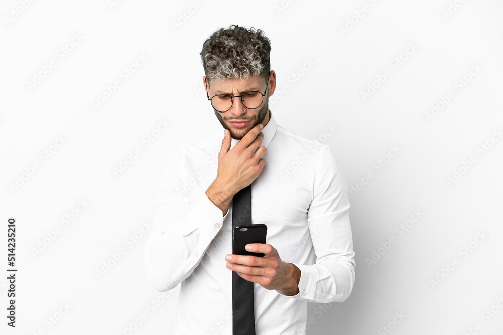 Business caucasian man isolated on white background thinking and sending a message Business caucasian man isolated on white background thinking and sending a message