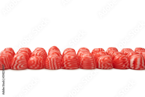Red round tasty gummy candies islolated on a white background.