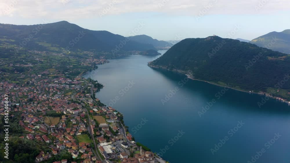 Aerial video with drone. Panoramic view of the resort town of Garda the north of Italy. Riva del Garda cityscape is town and comune in the Italian province of Trento of the Trentino Alto Adige region. Aerial video with drone. Panoramic view of the resort town of Garda the north of Italy. Riva del Garda cityscape is town and comune in the Italian province of Trento of the Trentino Alto Adige region.