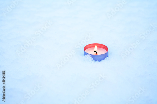 Candle In Snow