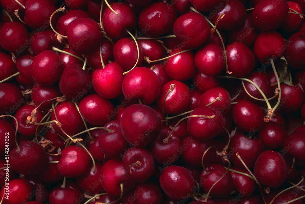 Background top view of ripe sweet cherries texture. Close up fruit. Background top view of ripe sweet cherries texture. Close up fruit.