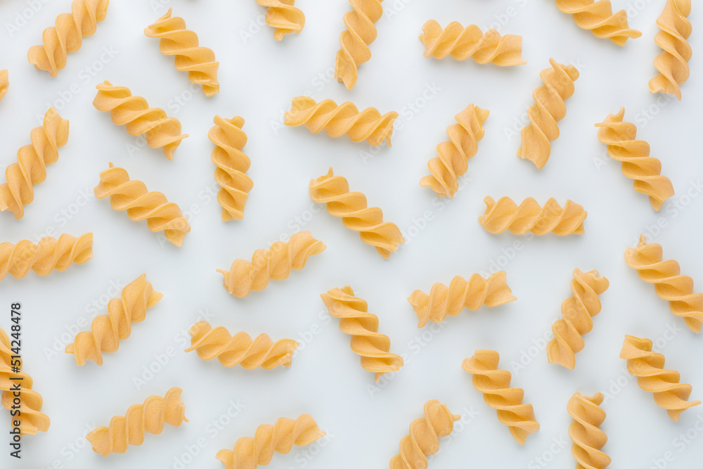 Pattern made of pasta on pastel background. Flat lay. Pattern made of pasta on pastel background. Flat lay.