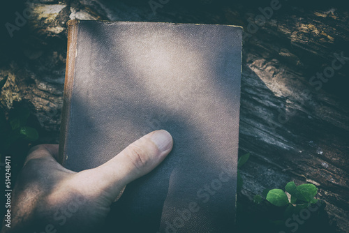 Old mystery book. An old book of witchcraft. photo