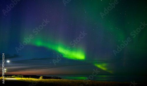 Wallpaper Mural Northern lights over a fjord in the remote east of Iceland Torontodigital.ca